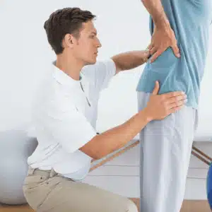 A therapist guides back support