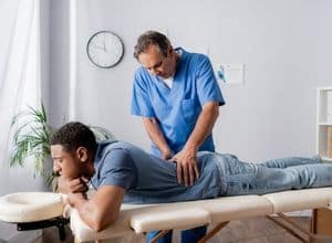 A chiropractor can help treat herniated disc pain.