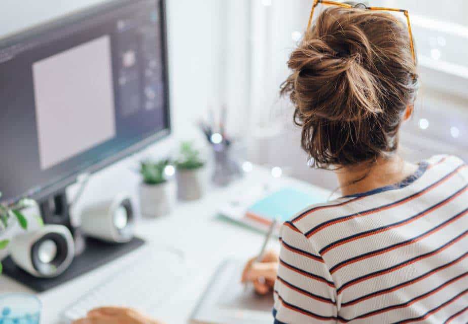 To avoid back pain while working from home, make sure the monitor is at comfortable height.